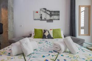 Posteľ alebo postele v izbe v ubytovaní Apartamento de diseño centro Sevilla. WiFi/AC
