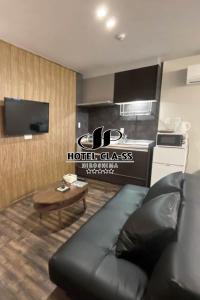 Kuchyň nebo kuchyňský kout v ubytování HOTEL CLA-SS HIROSHIMA-OZU