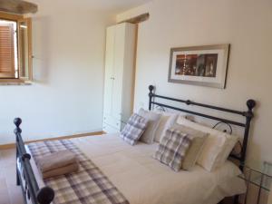 Giường trong phòng chung tại Casa sul Monte