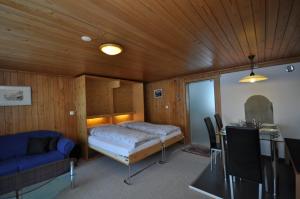 Postel nebo postele na pokoji v ubytování Chalet Bim Chilchli