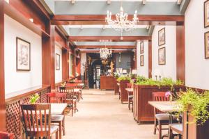 Reštaurácia alebo iné gastronomické zariadenie v ubytovaní Hotel Floryan Old Town