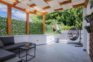 Posezení v ubytování Deluxe Rooms and Apartments Korzo