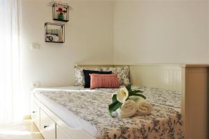 Postel nebo postele na pokoji v ubytování Iva Apartmani