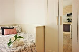 Postel nebo postele na pokoji v ubytování Iva Apartmani