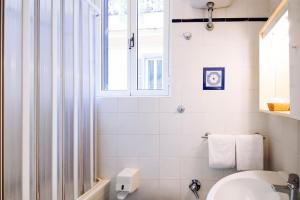 Koupelna v ubytování Hotel Grifo