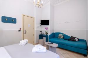 TV a/nebo společenská místnost v ubytování Hotel Grifo