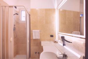 Koupelna v ubytování Hotel Grifo