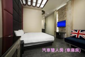 Letto o letti in una camera di Two Fukun Hotel