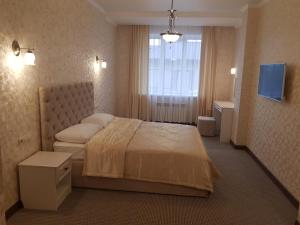 A bed or beds in a room at Гостевой дом Мелодия Жигулей, Самарская область, село Жигули