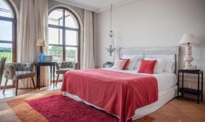 Postel nebo postele na pokoji v ubytování Casa Anamaria Hotel