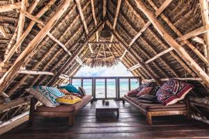 Posezení v ubytování Palafitta Zanzibar