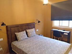 Posteľ alebo postele v izbe v ubytovaní San Rafael 2 Apartments