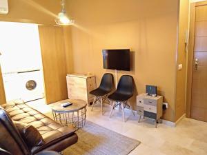 Televízia a/alebo spoločenská miestnosť v ubytovaní San Rafael 2 Apartments