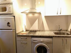 Kuchyňa alebo kuchynka v ubytovaní San Rafael 2 Apartments + 9 fotografií