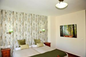 Postel nebo postele na pokoji v ubytování Hotel La Fuentecilla
