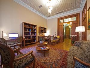 a living room with a couch and a table at Celine Hotel - Ottoman Mansion in Istanbul