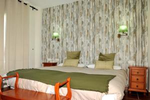 Postel nebo postele na pokoji v ubytování Hotel La Fuentecilla