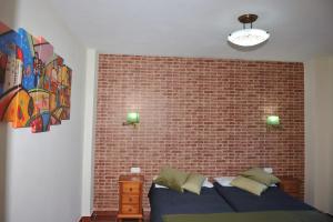 Postel nebo postele na pokoji v ubytování Hotel La Fuentecilla