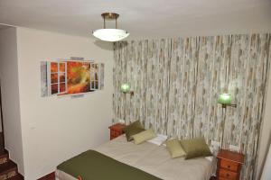 Postel nebo postele na pokoji v ubytování Hotel La Fuentecilla
