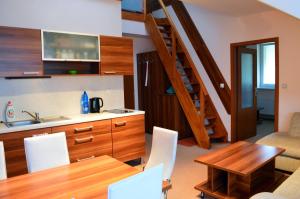 Kuchyň nebo kuchyňský kout v ubytování Apartmán G4 v Tatranskej Štrbe - Apartmánový dom Golem