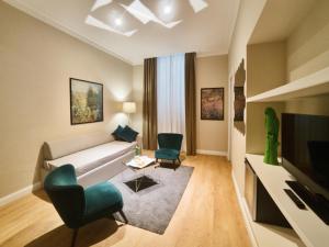 TV a/nebo společenská místnost v ubytování Hotel Touring Wellness & Beauty