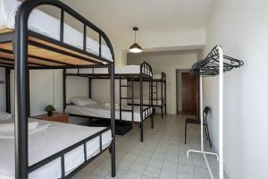 Postel nebo postele na pokoji v ubytování White Hostel