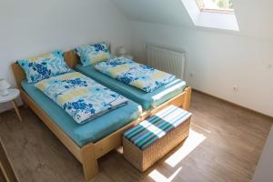 A bed or beds in a room at Apartments Olip