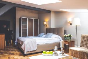 Posteľ alebo postele v izbe v ubytovaní Hotel Floryan Old Town