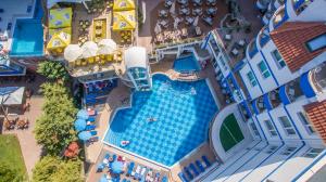 an overhead view of a pool at an amusement park at Hotel Villa List in Sozopol