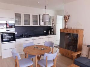 Kuchyň nebo kuchyňský kout v ubytování Ferienwohnung Haffduurn