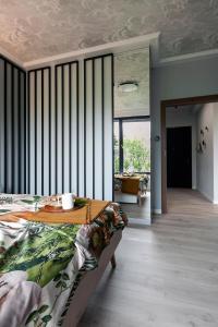 Posteľ alebo postele v izbe v ubytovaní Flora Apartment Deluxe - Hav Aparts (Botanica)