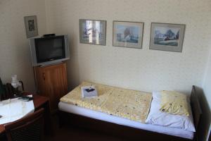 Postel nebo postele na pokoji v ubytování Hotel Panský Dům Žamberk