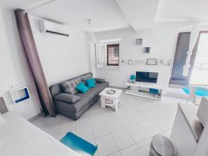 TV a/nebo společenská místnost v ubytování Apartment Estera