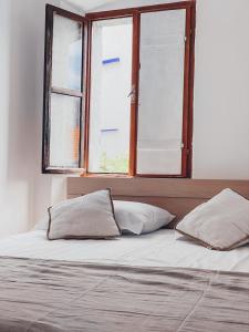Postel nebo postele na pokoji v ubytování Apartment Estera
