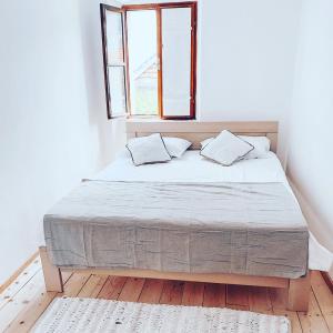 Postel nebo postele na pokoji v ubytování Apartment Estera