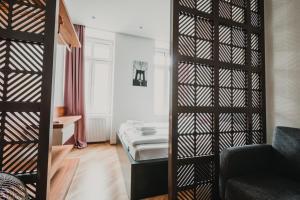 Łóżko lub łóżka w pokoju w obiekcie ZEUS Design Apartments Wasserwelt