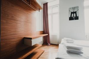 Łóżko lub łóżka w pokoju w obiekcie ZEUS Design Apartments Wasserwelt