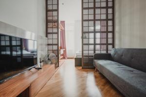 Telewizja i/lub zestaw kina domowego w obiekcie ZEUS Design Apartments Wasserwelt