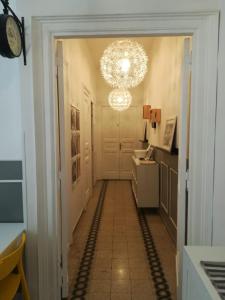A kitchen or kitchenette at MiRhome Guest House