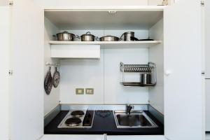A kitchen or kitchenette at Residence Degli Aranci