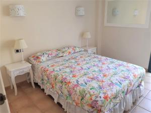 A bed or beds in a room at Atico con Impresionantes Vistas