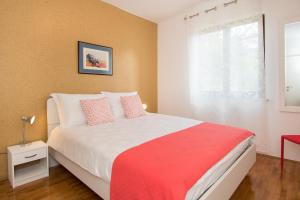 Posteľ alebo postele v izbe v ubytovaní Apartments Palmic