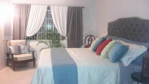 Lorenton Hideaway 객실 침대