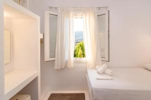 Ένα ή περισσότερα κρεβάτια σε δωμάτιο στο Avissalou Apartments
