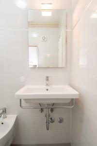 Kúpeľňa v ubytovaní Apartments Palmic