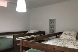 A bed or beds in a room at LA BARSONERA