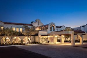 a large house with a driveway in front of it at Chaminade Resort & Spa in Santa Cruz
