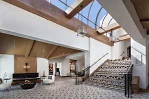 a large room with a staircase leading to a stairwell at Chaminade Resort & Spa in Santa Cruz