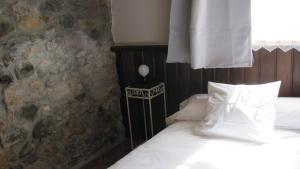 Un pat sau paturi într-o cameră la Casa Rural Barturen