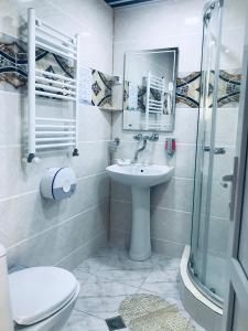 Koupelna v ubytování Hotel Gora